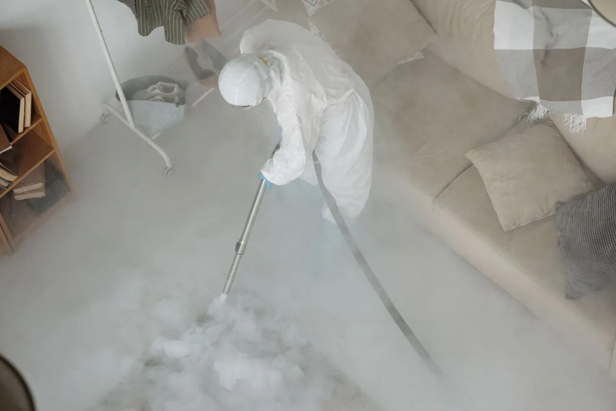 Biohazard cleanup technician in protective equipment, Avondale Estates, GA